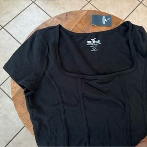 Hollister Black “Baby Tee” Size L.